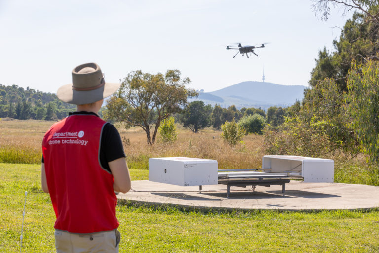 Drone pilot operating drone